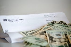 IRS audit letter and pile of cash