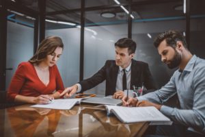 An lawyer working with clients through an ADR