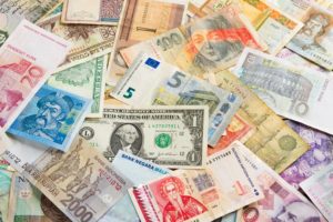 Colorful international money from all world pattern / background