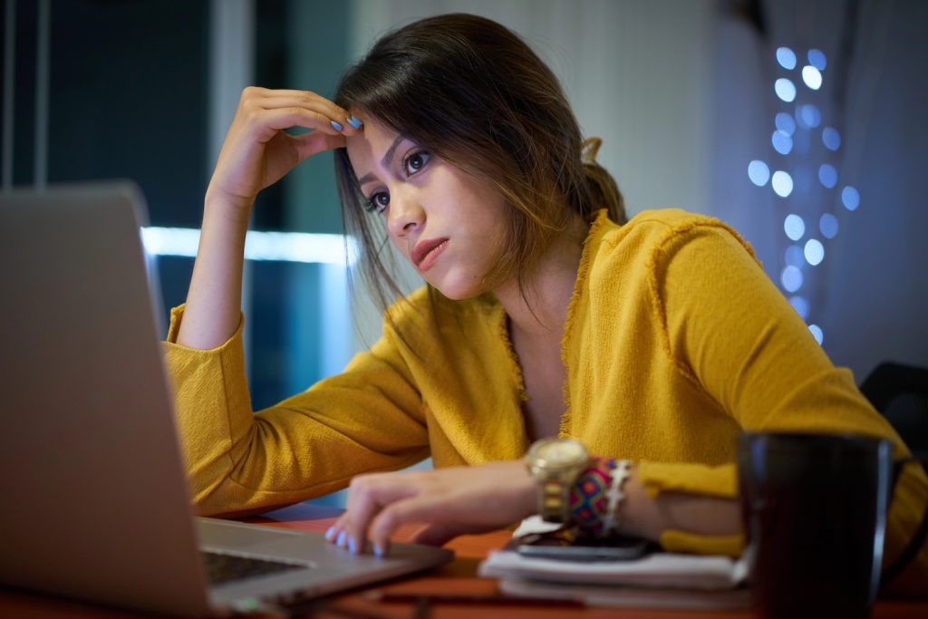 frustrated woman at computer