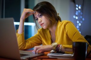 frustrated woman at computer