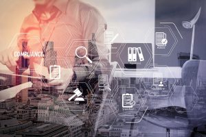 Compliance Virtual Diagram for regulations, law, standards, requirements and audit.businessman working with digital tablet and laptop computer and card tag in modern office.