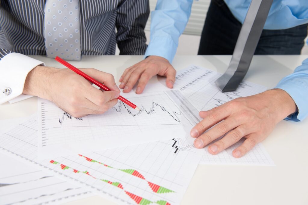 Business partners reviwing 2026 pricing