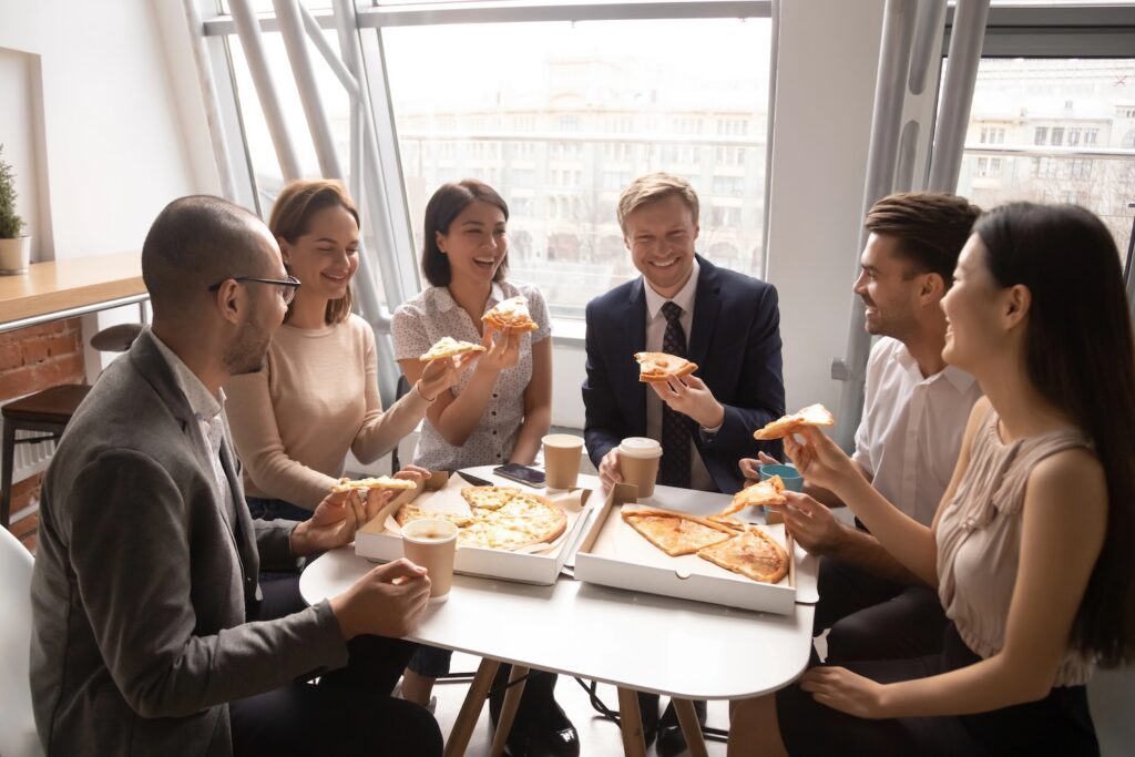 employees enjoying lunch together