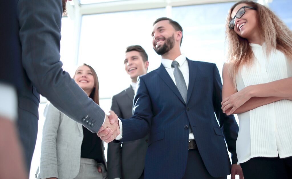 business clients greeting each other with a handshake